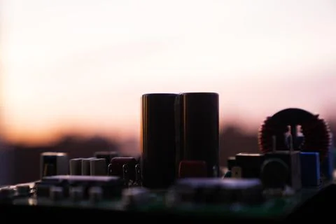 Cinematic Moody Close-up of Electronic Components at Sunset Stock Photos