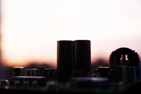Cinematic Moody Close-up of Electronic Components at Sunset Stock Photos