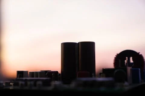 Cinematic Moody Close-up of Electronic Components at Sunset Stock Photos