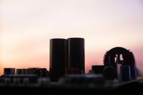 Cinematic Moody Close-up of Electronic Components at Sunset Stock Photos