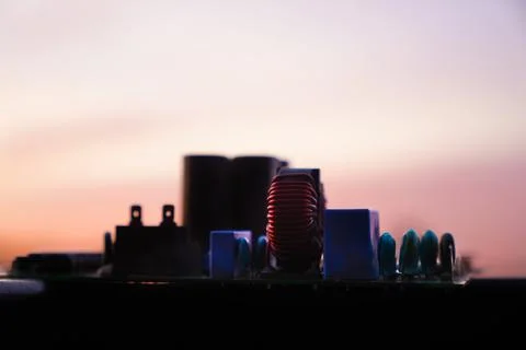 Cinematic Moody Close-up of Electronic Components at Sunset Stock Photos