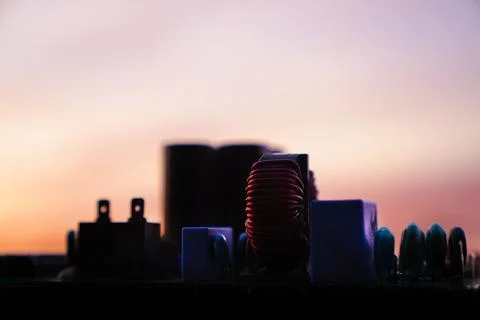 Cinematic Moody Close-up of Electronic Components at Sunset Stock Photos