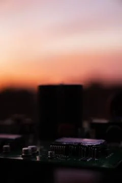 Cinematic Moody Close-up of Electronic Components at Sunset Stock Photos