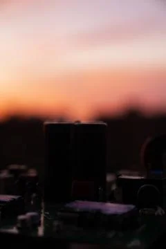 Cinematic Moody Close-up of Electronic Components at Sunset Stock Photos
