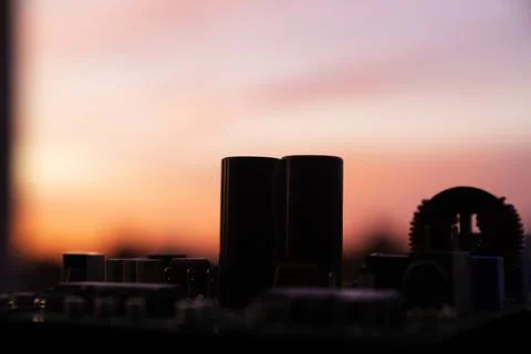 Cinematic Moody Close-up of Electronic Components at Sunset Stock Photos
