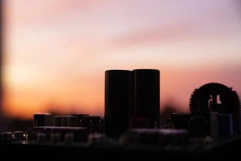 Cinematic Moody Close-up of Electronic Components at Sunset Stock Photos