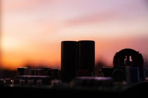 Cinematic Moody Close-up of Electronic Components at Sunset Stock Photos
