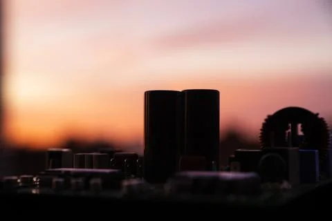 Cinematic Moody Close-up of Electronic Components at Sunset Stock Photos