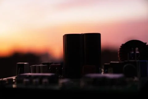 Cinematic Moody Close-up of Electronic Components at Sunset Stock Photos