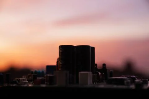 Cinematic Moody Close-up of Electronic Components at Sunset Stock Photos