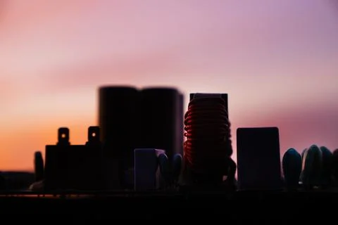 Cinematic Moody Close-up of Electronic Components at Sunset Stock Photos
