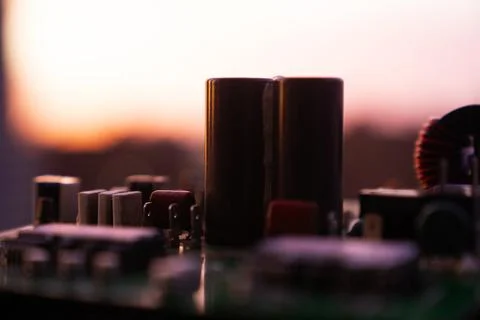 Cinematic Moody Close-up of Electronic Components at Sunset Stock Photos