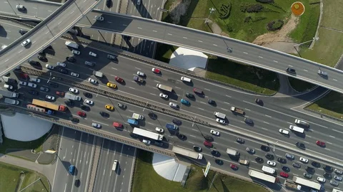 Cinematic multilevel road junction overpass road track active traffic jam Aerial Stockbeeldmateriaal 117664922