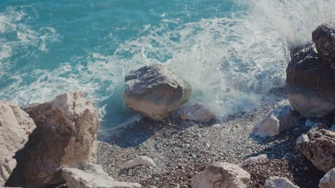 Cinematic nature. Top down view magnificent island beach with rocks under Video stock 124934094