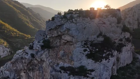 Cinematic Orbit Around Ancient Castle at Golden Sunset Stock Footage 337352974