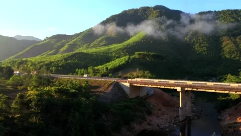 Cinematic Orbit Around Mountain Bridge with Morning Mist, Vietnam Video stock 336857254