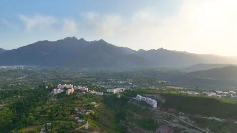 Cinematic Orbit drone flight over Katra Town and Vaishno Devi Trikuta hills. Stock Footage 335641437