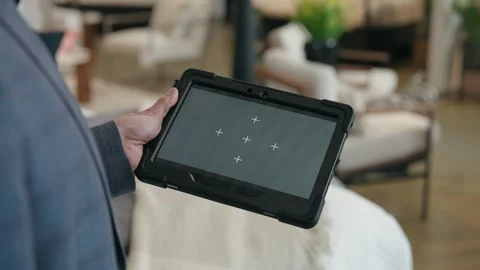 Cinematic Orbit of Grey Screen Tablet With Motion Tracking Points Stock Footage 310369230