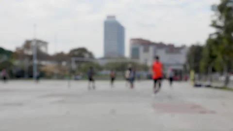Cinematic out of focus slow motion shot of men playing volleyball on open air Vídeo Stock 132648038