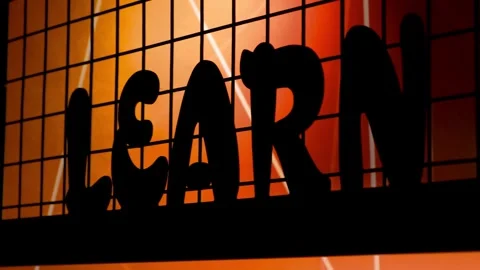 Cinematic Pan of "LEARN" Silhouette Text with Red Backlight - 4K Real Time Stock Footage 327863517