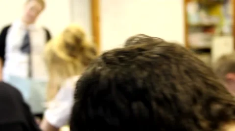 Cinematic Pan over working students 库存影片 48991452