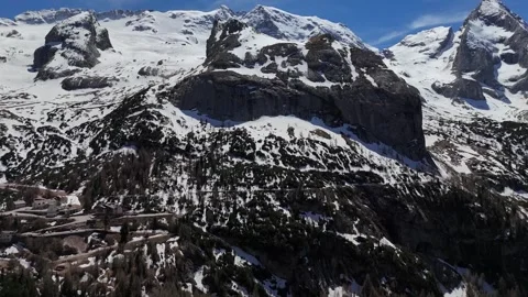 Cinematic Partial Orbit of Rugged Mountain Summit in Frozen Alpine Wilde Stock Footage 339661596