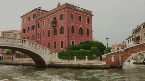 Cinematic passage under the bridge on the Venice canal Stock Footage 228667835