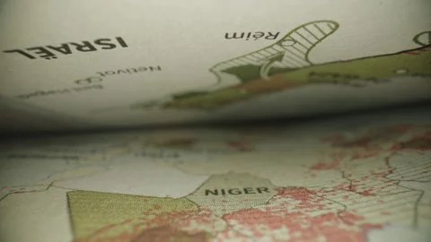 Cinematic Perspective of Book Pages Displaying Gaza and Surroundings Stock Footage 338014982