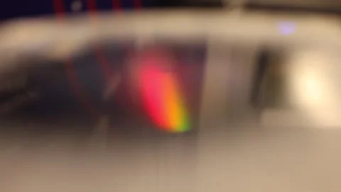 Cinematic playing a vinyl record selective focus,lights in background Video stock 312398891