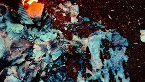 Cinematic pov of burning papers creating pollution 動画素材 342689641