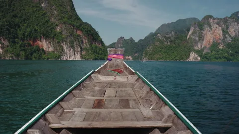 Cinematic POV from Traditional Longtail Boat Prow Sailing Towards Iconic Stock-Footage 334643553