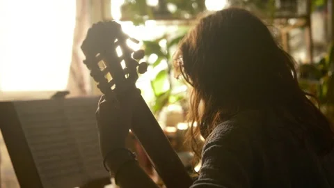Cinematic, professional classical guitar playing  teenager hands, fingers Stock Footage 318914140