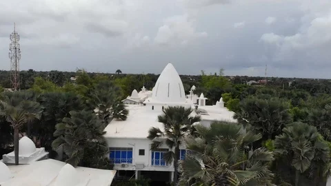 Cinematic Pull up through Beautiful White  Walls of Resort Stock Footage 118387404