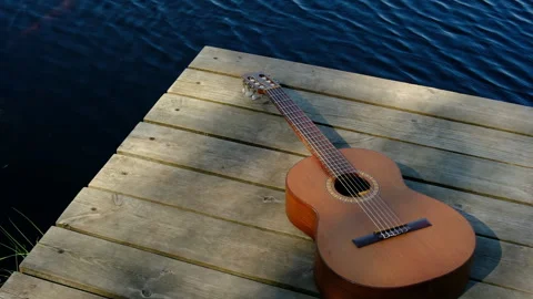 Cinematic rays of the evening sun. classical guitar Stock Footage 284243876