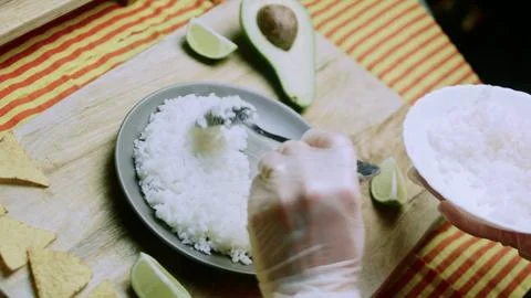Cinematic recipe study of clean rice presentation beside lime 스톡 사진