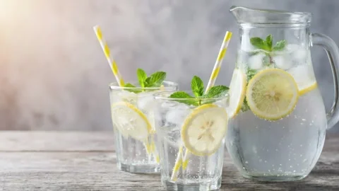 A cinematic, refreshing close-up of a summer detox drink Video stock 333839028