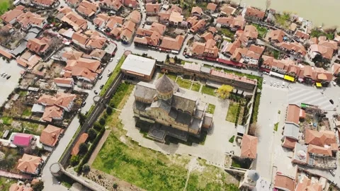 Cinematic rising aerial view Mtskheta cathedral panorama surrounded tradition Stock Footage 151735613