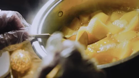 Cinematic rustic food view: boiling potatoes until tender Stock Footage 342196100