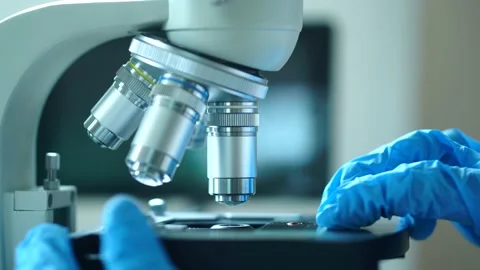 Cinematic Scientist Preparing To Use Microscope In Laboratory Stock Footage 135305391