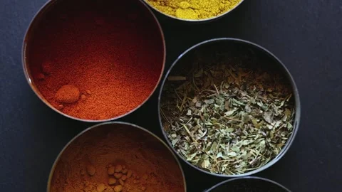 Cinematic sequence of steel containers with various spices, top view Stock Footage 317108655