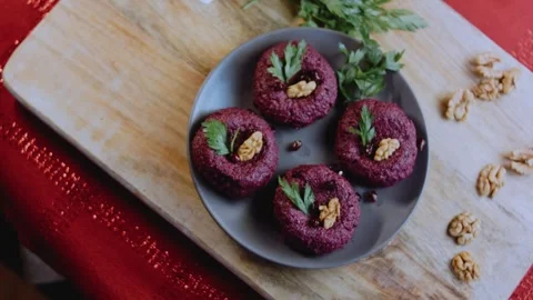 Cinematic serving detail: capturing walnut and beet texture Stock Footage 342200467