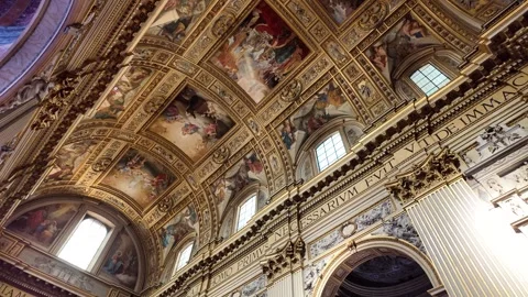 Cinematic shot of the baroque ceiling and interior of Sant Andrea della Valle Stock Footage 338010636