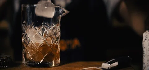 Cinematic Shot of a Bartender Making an Old Fashioned Video stock 115022108