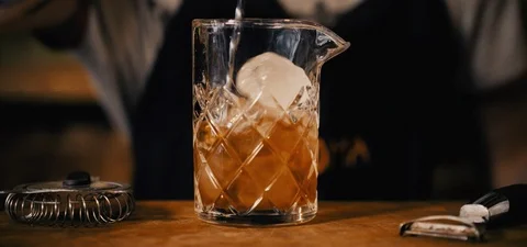 Cinematic Shot of a Bartender Making an Old Fashioned Video stock 115022922