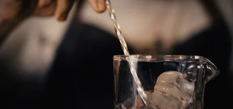 Cinematic Shot of a Bartender Making an Old Fashioned Video stock 115023760