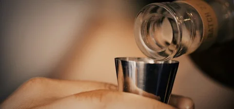 Cinematic Shot of a Bartender Making an Old Fashioned Video stock 115043610