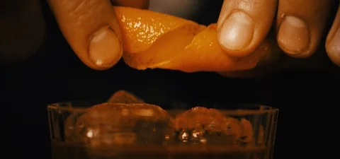 Cinematic Shot of a Bartender Making an Old Fashioned Video stock 115048077
