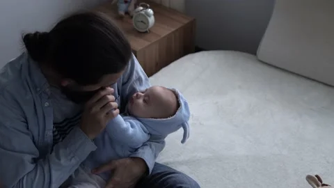 Cinematic Shot Bearded Long-haired Young Neo Father Holds And Kissing Hand Of Video stock 168151997
