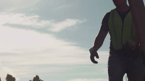 Cinematic shot of construction worker walking around concrete pour Stock Footage 55146814