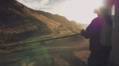 Cinematic shot of construction workers smoothing concrete Stock Footage 55155351